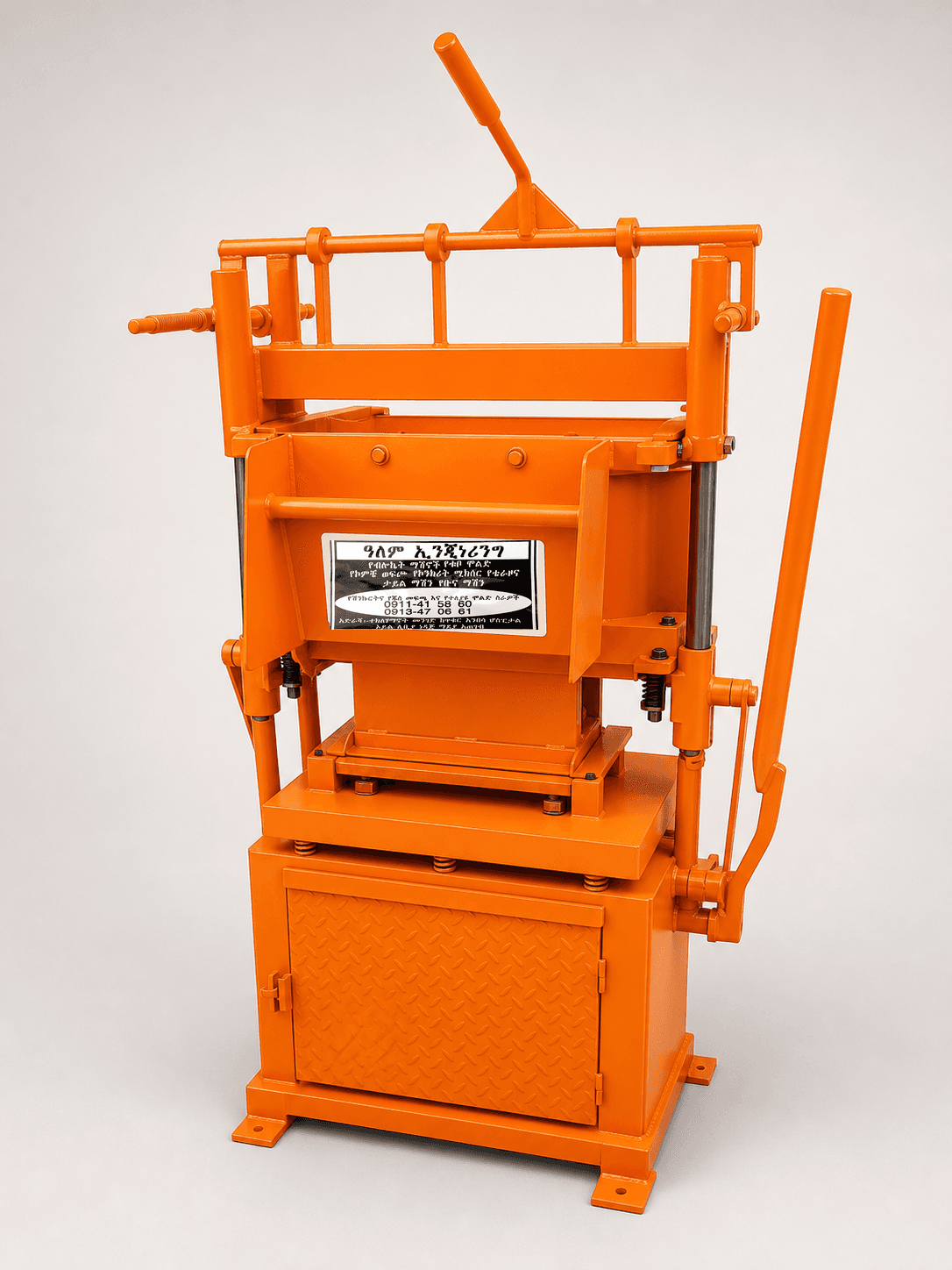 Orange manual hollow block machine made by Alem Engineering